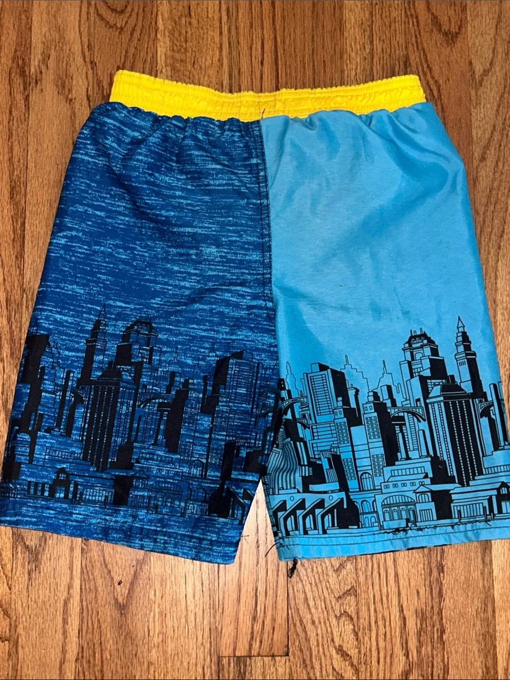 Boys Batman Blue and Yellow Graphic Swim Trunks Inner Tag Detail size 5T